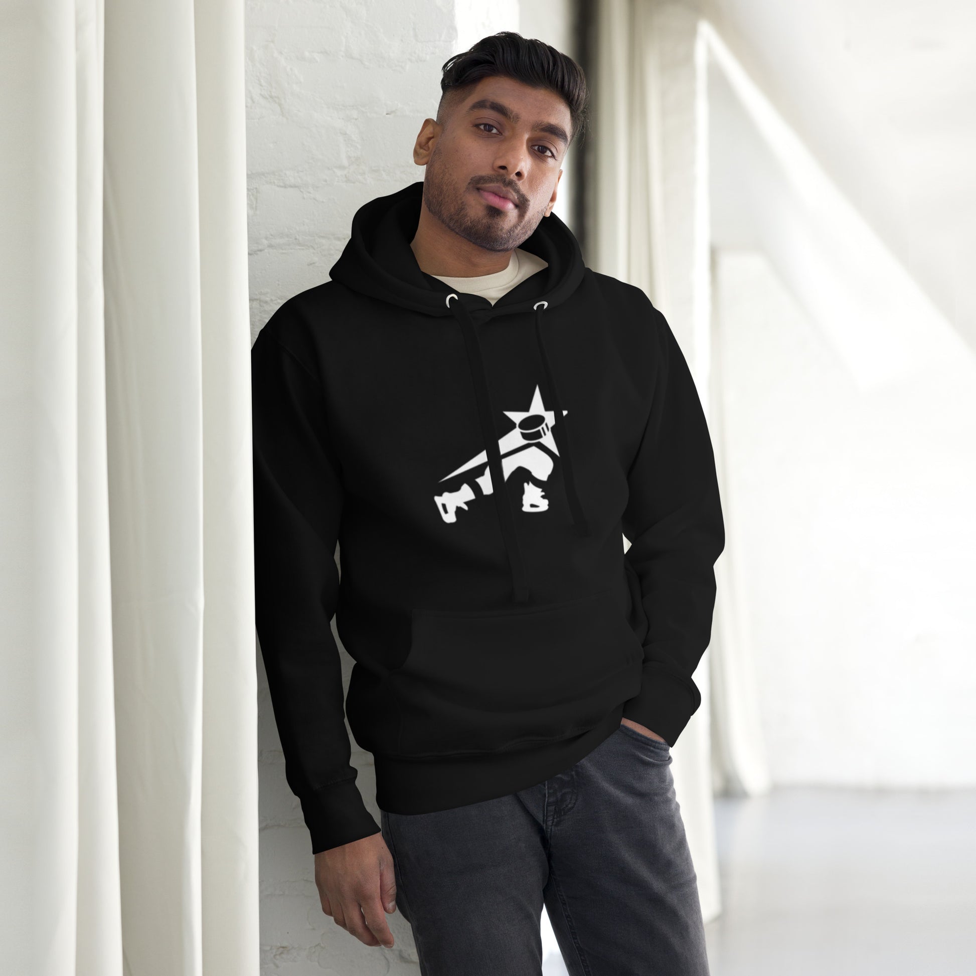 Confident man wearing a black heather gray hoodie 